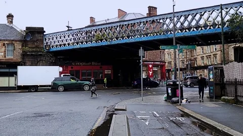 Static view of old blue railway bridge in the city Stock Footage 164057974