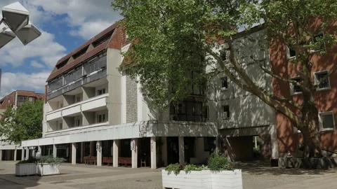 Static view of old east German empty shopping street with few people Stock Footage 200890687