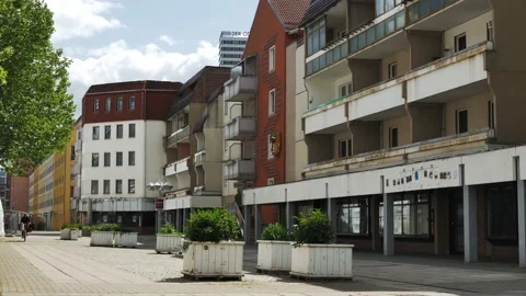 Static view of old east German empty shopping street with few people Stock Footage 200891208