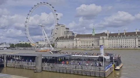 Static view of passenger ferry departs from Westminster pier in London, England. Stock Footage 314974217
