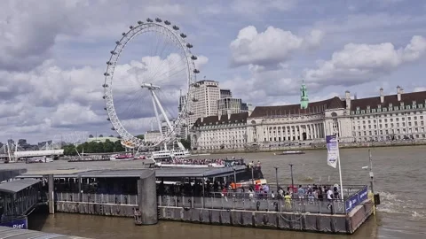 Static view of passenger ferry departs from Westminster pier in London, England. Stock Footage 314974233