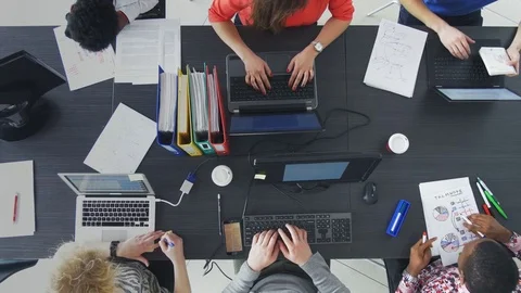 Static view of people working efficiently in a contemporary workplace Stock Footage 73849913