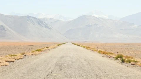 Static view popular the M41 road or Pamir Highway road with Pamir Mountains.. Stock-Footage 281435733