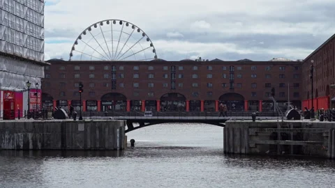 Static view of Royal Albert Dock and giant Ferris wheel in Liverpool Stock Footage 348363866