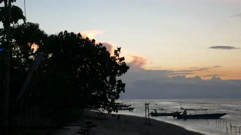Static view on sunset and boats on the beach Stock Footage 165623098