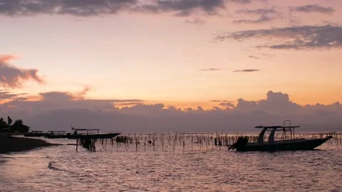 Static view on sunset and boats on the beach Stock Footage 165773198