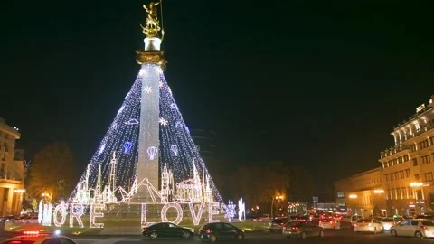 Static view Tbilisi freedom square on Christmas with decorations and traffic  Stock-Footage 166895427