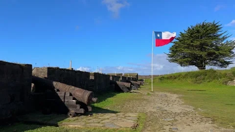 Static Wide of Chilean Flag Wave by Historic Cannons at San Sebastian de la Видео 336639529