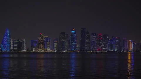 Static wide night view of Doha's illuminated West Bay skyline. Stock Footage 344872707