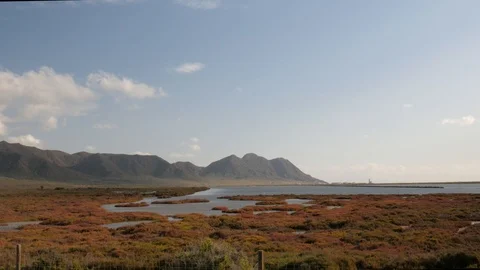 Static wide shot of "cabo de Gata" cape in south of Spain with wild laguna Stock Footage 121679866