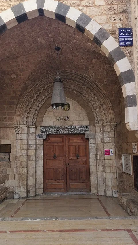 A static, wide shot of the main mosque entrance Stock Footage 314314010