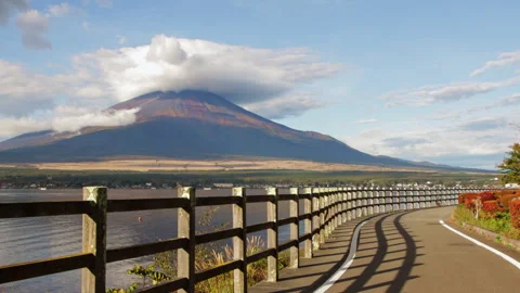 Static wide shot of Mount Fuji with lenticular clouds at Lake Yamanaka Stock Footage 321128417