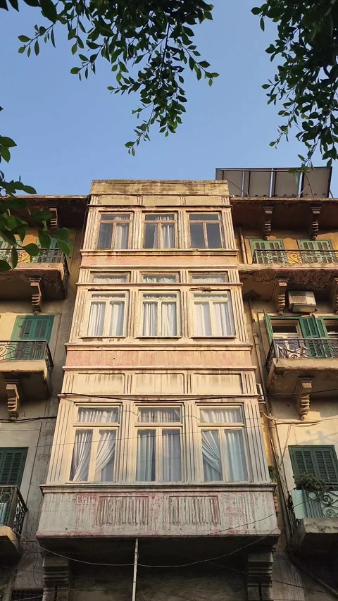 A static, wide shot of a multi-story building facade Stock-Footage 314500421