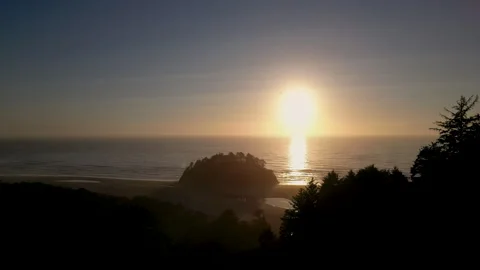 Static wide shot of Proposal rock at Neskowin beach at Sunset Stock Footage 249028857