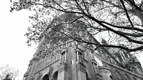 Static wide shot of the Saint-Augustin Church upper facade and rose window under Vídeos de archivo 332656715