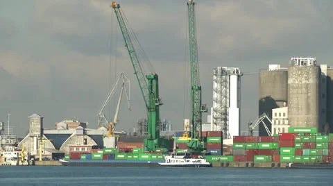 Statick shot of Belgian harbor with ships passing on a sunny day. Stock Footage 35289350