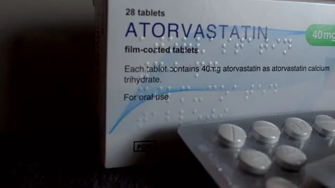Statins tablets for cholesterol management close-up Stock Footage 277323040