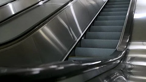 Station escalators. Empty escalator steps, moving staircase Stock Footage 305988831