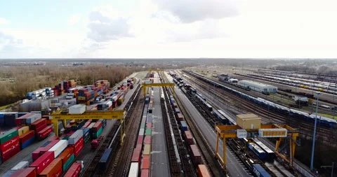 Station with freight trains and containers in aerial view Stock Footage 85647039