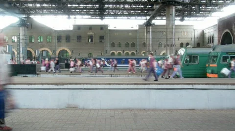 Station, some trains and people on platforms. Time lapse. Stock Footage