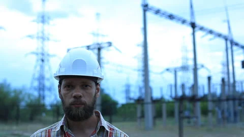 Station technical director with working drawings at nuclear power station Stock Footage 92779743