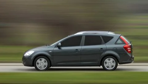 Station wagon in motion Stock Photos