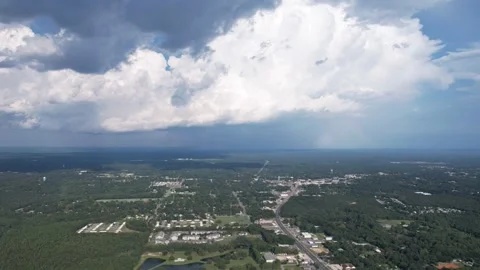 Stationary aerial hyperlapse of rolling clouds over Crestview FL 스톡 동영상 249777254