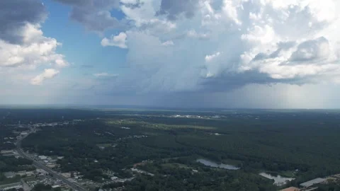 Stationary aerial hyperlapse of storm clouds over Crestview FL 스톡 동영상 249776769