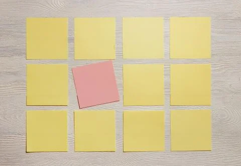 Stationary, Blank Colored Sticker Notes on White Wooden Board. Top View. Flat Stock Photos