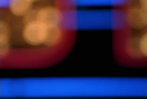 Stationary close view of blurred neon lights flashing Stock Footage 86884831