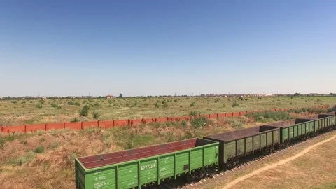 Stationary freight train with empty cargo containers Stock Footage 88170535