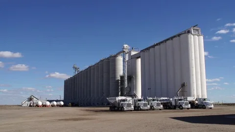 Stationary Shot of Concrete Grain Elevator / Crop Production Facility Stock Footage 73024391