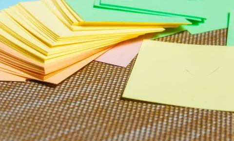 Stationary, Stack of Blank Colored Sticker on Brown Board. Time-management Stock Photos