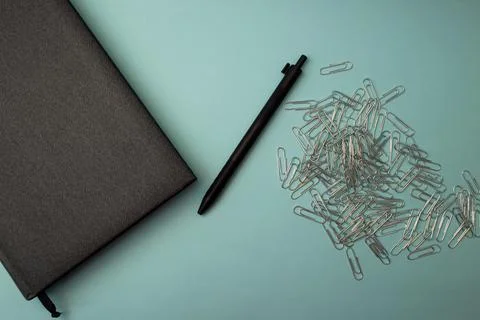 Stationery and notepad lie on the background Stock Photos