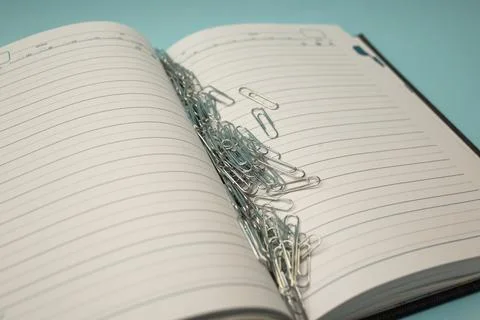 Stationery and notepad lie on the background Stock Photos