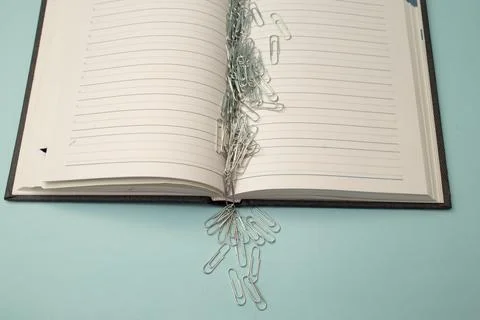 Stationery and notepad lie on the background Stock Photos