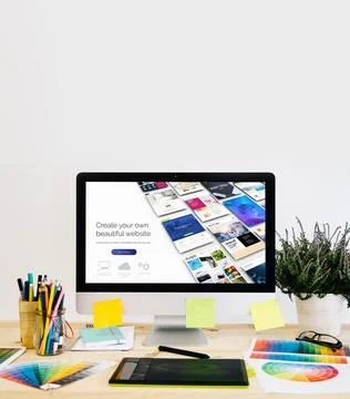 Stationery desktop with design stuff, computer and graphic tablet Stock Illustration