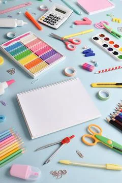 Stationery on a light blue background with space for text. Stock Photos