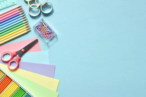 Stationery on a light blue background with space for text. Back to school. Fl Foto stock