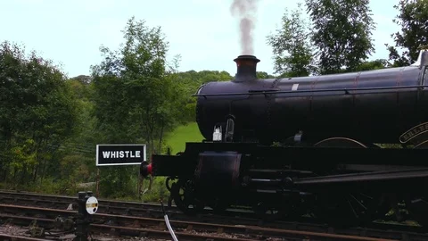 Stationery vintage steam engine producing smoke Stock Footage 80292648