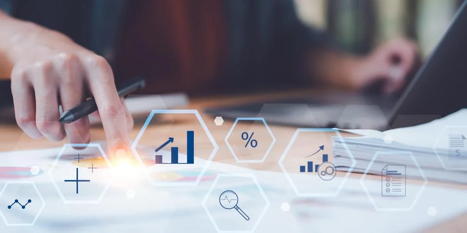 Statistical analyst reading graph report and business statistics charts ,An.. 스톡 사진