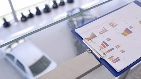 Statistical Charts Of Car Sales Stock Footage 87396079