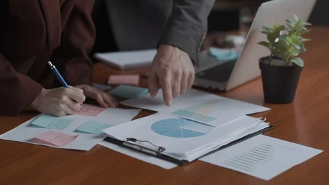 Statistical data and analytical job. international team work, project management Stock Footage 129355261