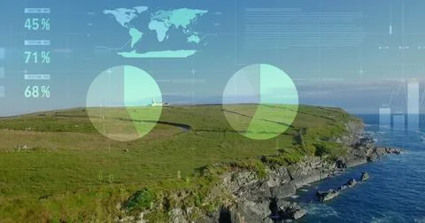 Statistical data processing against aerial view of landscape with grassland, sea Foto stock