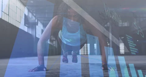 Statistical data processing against african american woman performing pushup 動画素材 150118797