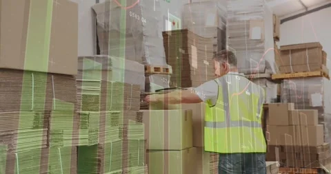 Statistical data processing against caucasian senior worker stacking boxes at Stock Footage 327361962