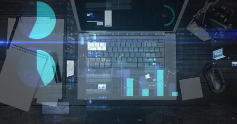 Statistical data processing against overhead view of laptop and office equipment Stock Photos