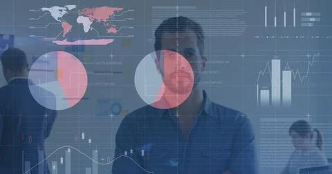 Statistical data processing against portrait of caucasian man smiling at office 스톡 사진