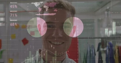 Statistical data processing against portrait of caucasian man smiling at office Stock Photos