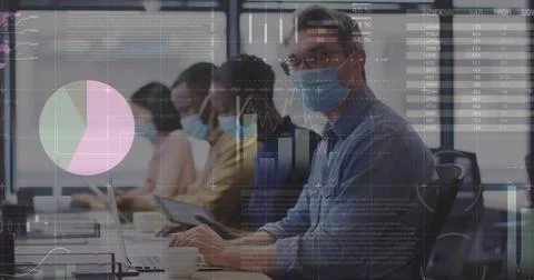 Statistical data processing over portrait of caucasian man wearing face mask Stock Photos